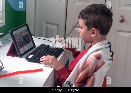 4nd grade student during distance learning class, Washington state, USA, Stock Photo