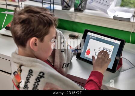 4nd grade student during distance learning class, Washington state, USA, Stock Photo