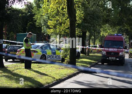 West Midlands Police and WMFS at the scene of a car which crashed into a house in Birmingham by a 16-year old Stock Photo