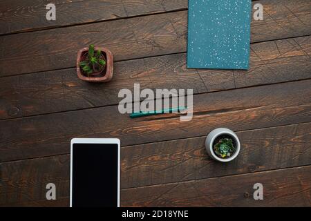 Minimal background image of smartphone and business accessories on textured wooden desk, top view, copy space Stock Photo