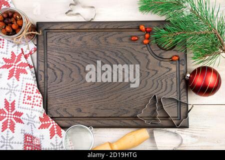 Happy new year 2021 and merry Christmas, festive composition with kitchen accessories and Christmas toys. Stock Photo