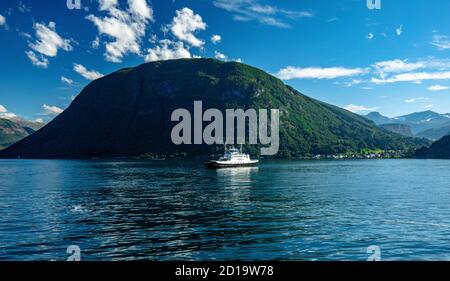 EIDSDAL, NORWAY - AUGUST, 17, 2020: Ferry crossing between Linge and Eidsdal on the scenic Route 63 across the Tafjorden, Norway Stock Photo