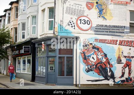 Morecambe bay Lancashire  John McGuinness ‘The Morecambe Missile’ Isle of man TT  mural project called Victoria Press by illustrator Ben Tallon Stock Photo