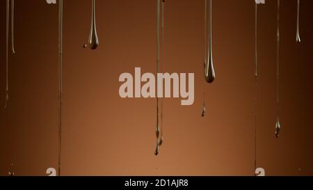 Dripping melted chocolate on soft background, abstract background Stock Photo