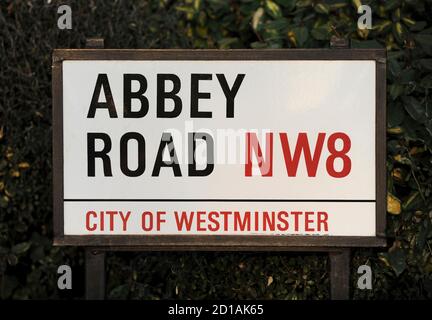 The Abbey Road street sign is seen, in north London February 17, 2010. The Abbey Road recording studio immortalised by the multi-million-selling Beatles album of the same name has been put up for sale by its owners. Debt-laden music company EMI is seeking buyers for Abbey Road Studios, a Mecca for Beatles fans around the world who pose for photographs imitating the picture on the 1969 'Abbey Road' album cover which shows Paul, John, George and Ringo strolling over a pedestrian crossing outside the studio.   REUTERS/Jas Lehal (BRITAIN - Tags: ENTERTAINMENT BUSINESS SOCIETY)