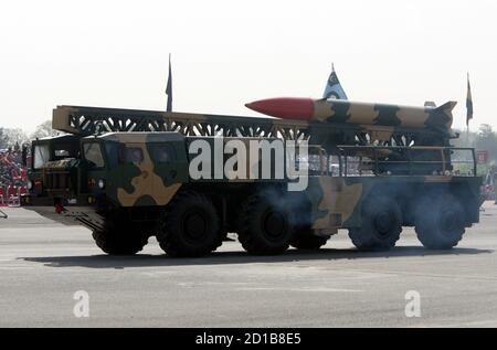 A nuclear-capable ballistic missile Hatf-II Abdali drives by with its mobile-launcher during the Pakistan National Day parade in Islamabad March 23, 2007. Pakistan successfully tested a short-range nuclear-capable ballistic missile on Saturday, the military said. Picture taken March 23, 2007. REUTERS/Mian Khursheed  (PAKISTAN)