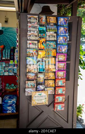 Lahaina, Maui, Hawaii. Local shop displays a colorful rack of postcards for the tourists to buy while on vacation. Stock Photo