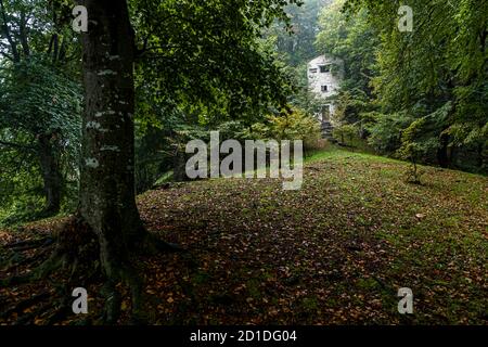 Hidden among the trees, at an altitude of 950 meters stands the Roccolo Meri, the bird tower of Scudellate. The tower has been restored and can also be visited at certain times. Roccolo in Scudelate, Ticino, Switzerland Stock Photo