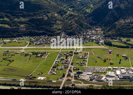On the runway at Turtmann Airport it says in large letters: 'There is a man', Switzerland Stock Photo