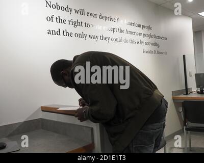 Dayton, OH, USA. 5th Oct, 2020. A new voter registers at the local board of elections. Credit: Sue Dorfman/ZUMA Wire/Alamy Live News Stock Photo