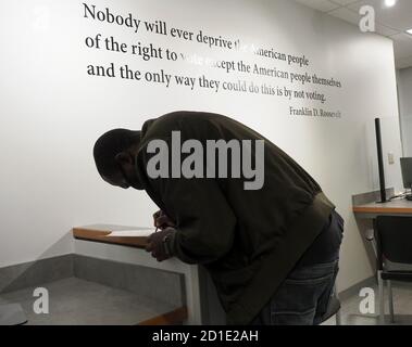 Dayton, OH, USA. 5th Oct, 2020. A new voter registers at the local board of elections. Credit: Sue Dorfman/ZUMA Wire/Alamy Live News Stock Photo