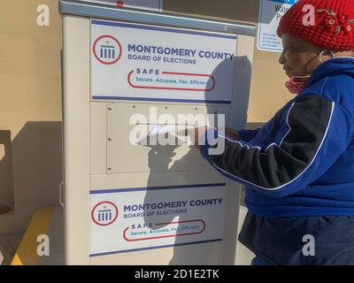 Dayton, OH, USA. 5th Oct, 2020. Addie Burrage drops off her election materials in one of OhioÃs secure vote dropboxes. Credit: Sue Dorfman/ZUMA Wire/Alamy Live News Stock Photo