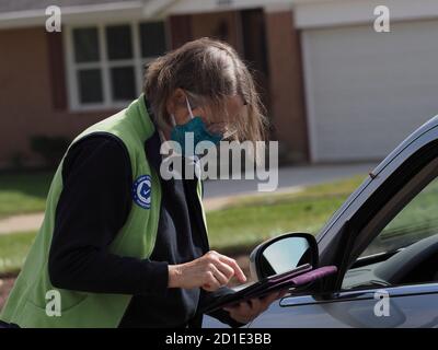 Dayton, OH, USA. 5th Oct, 2020. Volunteer voting registrar Alice Diebel checks that a voter registration is properly filed online. Credit: Sue Dorfman/ZUMA Wire/Alamy Live News Stock Photo