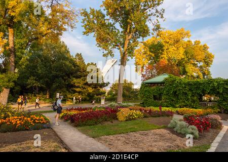 Montreal, CA - 26 September 2020: People enjoying a warm autumn day at the Botanical Garden