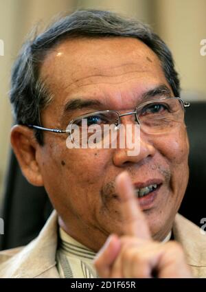 Malaysian Election Commission Chairman Abdul Rashid Abdul Rahman Gestures During An Interview At His Office In