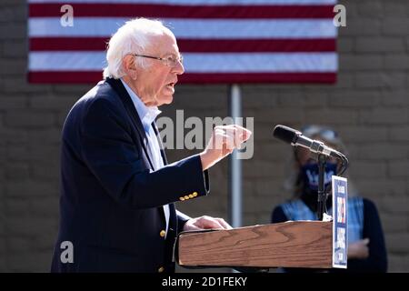 Ann Arbor, USA. 05th Oct, 2020. Sen. Bernie Sanders, I-Vt., speaks to a small, socially-distanced group of college students at the Kerrytown Market and Shops in Ann Arbor, Mich. on Oct. 5, 2020. Sanders emphasized the need to elect Joe Biden for president and highlighted Biden's plans for student debt. (Photo by Dominick Sokotoff/Sipa USA) Credit: Sipa USA/Alamy Live News Stock Photo