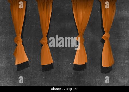 Orange curtain with black wall background Stock Photo