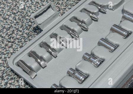 Set of the wrench in the opened toolbox on the carpet Stock Photo