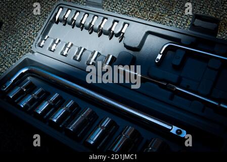 Set of the wrench in the opened toolbox on the carpet Stock Photo