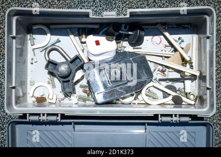 Opened toolbox on the carpet Stock Photo