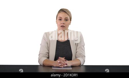 Young beautiful television announcer giving a speach, white back Stock Photo