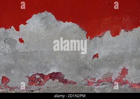 Peeled paint of old red wall, texture or background Stock Photo