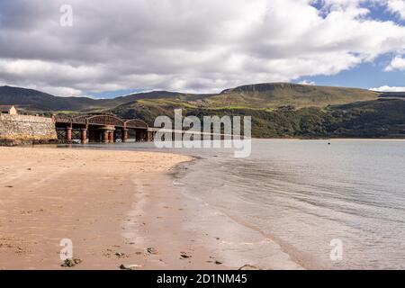 Barmouth railway bridge over the Mawddach estuary on the Wales coast Stock Photo