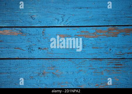 Horizontal planks of wood, painted by light blue color. Texture with cracks and rough timber with copy space Stock Photo
