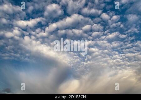 fluffy white and grey clouds during a summer day in Marbella, Spain landscape Stock Photo