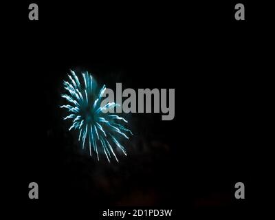 Burning sparklers on black background. Small fireworks giving off sparks of fire. Sparks explosion. During Armada exhibition in France Stock Photo