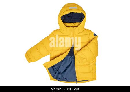 Winter jackets for children. Stylish, yellow, warm down jacket for children with removable hood, isolated on a white background. Winter fashion. Stock Photo