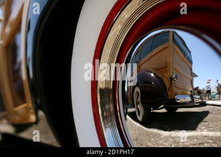 Reflection Of A Classic Car In Another Classic Car Wheel Cap Stock Photo Alamy