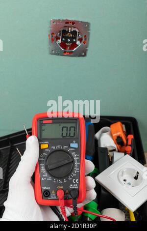 Tools for electrician needs: shocket multimeter, voltage testers, wire strippers, pliers, Stock Photo