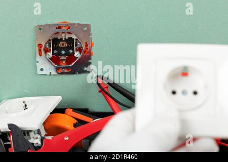 Tools for electrician needs: multimeter, voltage testers, wire strippers, pliers, Stock Photo