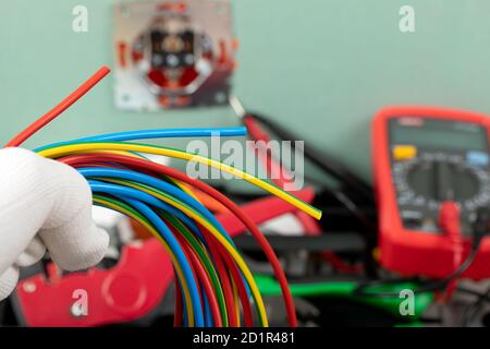 Tools for electrician needs: multimeter, voltage testers, wire strippers, pliers, Stock Photo