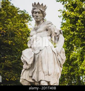 Rococo sculpture in the Saxon Garden, Warsaw, Poland. Made before 1745 by anonymous Warsaw sculptor under the direction of Johann Georg Plersch Stock Photo