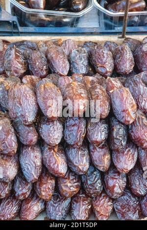 December 10th, 2019, Night Market. Vienna, Austria. Phoenix dactylifera, commonly known as date or date palm. Stock Photo