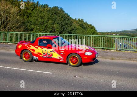 Lightning McQueen 2006 red 2616cc petrol coupe PIXAR Mazda Rx 8 192 PS UK Vehicular traffic transport modern saloon cars south bound on the 3 lane M6 motorway highway Stock Photo Alamy