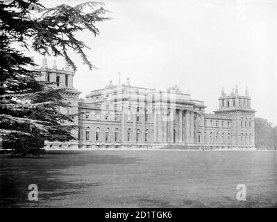 BLENHEIM PALACE, Woodstock, Oxfordshire. Looking along the south front of the 18th century palace from the west, showing the central portico supported on columns and the lawn in the foreground. Photographed in 1912 by Henry Taunt. Stock Photo