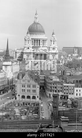 CITY OF LONDON. An elevated view of the City of London looking towards St Paul's Cathedral. The empty building plots being used as car parks in the foreground are bomb sites which had still not been developed when the photograph was taken. Photographed by Eric de Mare between 1950 and 1959. Stock Photo