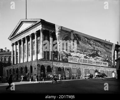 TOWN HALL, Birmingham, West Midlands. View of the Town Hall with banner covering one side, promoting Warship Week, October 18th - 26th. 'England expects our city to subscribe £10,000,000...' Photographed by G B Mason in 1941. Stock Photo