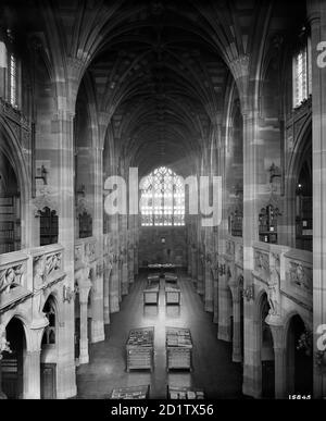 JOHN RYLANDS LIBRARY, Deansgate, Manchester. Interior, looking east from the gallery.  The library was completed in 1899 to the designs of architect Basil Champneys, and was commissioned by Enriqueta Augustina Rylands in memory of her late husband. The library is a fine example of Victorian Gothic Revival architecture. It later became part of the University of Manchester. Photographed by Bedford Lemere and Co. in 1900. Stock Photo