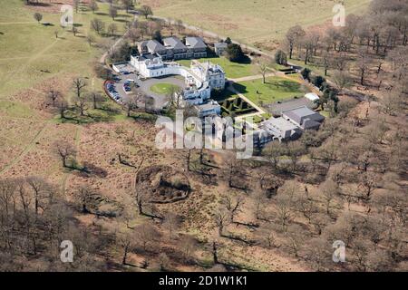 White Lodge, home of the Royal Ballet School and former hunting lodge with grounds designed by Humphry Repton c.1805, Richmond Park, London, UK. Aerial view. Stock Photo