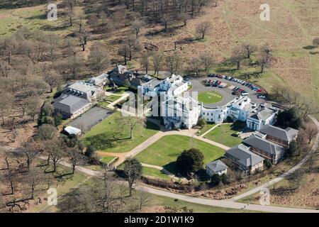 White Lodge, home of the Royal Ballet School and former hunting lodge with grounds designed by Humphry Repton c.1805, Richmond Park, London, UK. Aerial view. Stock Photo