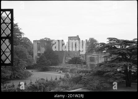 Exterior view of the ruins of Hardwick Old Hall, seen from a window in the west front of Hardwick Hall, showing the top of the west garden, over the garden wall to the ruins in the south-west, Chesterfield, Derbyshire, UK. Stock Photo