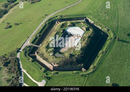 Bembridge Fort, a late 19th century hexagonal fort and barracks now partly converted to offices, Isle of Wight, 2014. Aerial view. Stock Photo