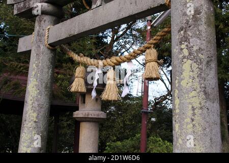 Torii gate and shimenawa rope of Honoohonome Jinja Shrine in Beppu ...