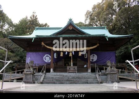 Torii gate and main temple of Honoohonome Jinja Shrine in Beppu. Taken ...