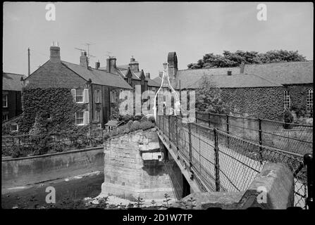 The Old Bridge and Footbridge, Chantry Place, Morpeth, Northumberland, UK. Stock Photo