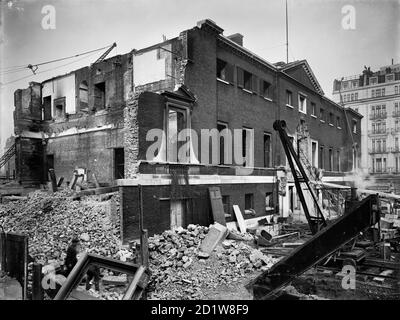 Devonshire House viewed from the south west during demolition with Berkeley Hotel partially visible in the background. Stock Photo